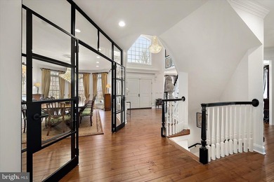 Set behind a private automated gate on nearly 3 acres, this on Golf Club At South River in Maryland - for sale on GolfHomes.com, golf home, golf lot