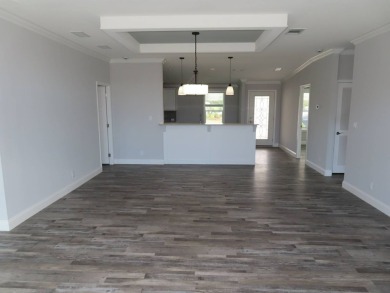 This never owned new Palm Harbor Black Diamond model is ready on Crane Lakes Golf and Country Club in Florida - for sale on GolfHomes.com, golf home, golf lot