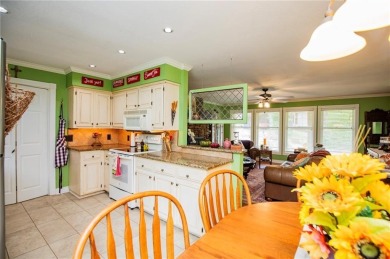 Adorable and cozy meets easy access. This quiet street is just a on Bella Vista Country Club - Kingswood in Arkansas - for sale on GolfHomes.com, golf home, golf lot