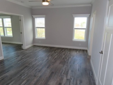 This never owned new Palm Harbor Black Diamond model is ready on Crane Lakes Golf and Country Club in Florida - for sale on GolfHomes.com, golf home, golf lot