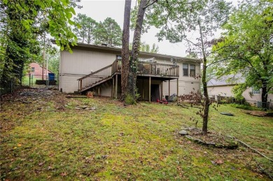 Adorable and cozy meets easy access. This quiet street is just a on Bella Vista Country Club - Kingswood in Arkansas - for sale on GolfHomes.com, golf home, golf lot