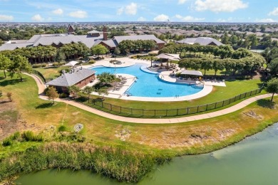 This Stunning home is located on a quiet cul-de-sac lot features on Frisco Lakes Golf Course in Texas - for sale on GolfHomes.com, golf home, golf lot