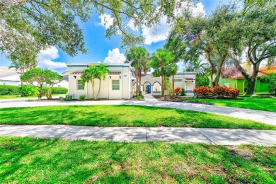 Experience refined Florida living in this stunning 3-bedroom, 3 on Bayou Golf Club in Florida - for sale on GolfHomes.com, golf home, golf lot