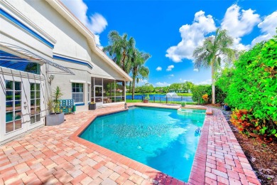 Experience refined Florida living in this stunning 3-bedroom, 3 on Bayou Golf Club in Florida - for sale on GolfHomes.com, golf home, golf lot