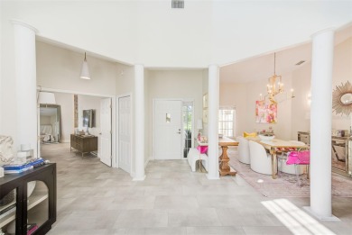 Experience refined Florida living in this stunning 3-bedroom, 3 on Bayou Golf Club in Florida - for sale on GolfHomes.com, golf home, golf lot