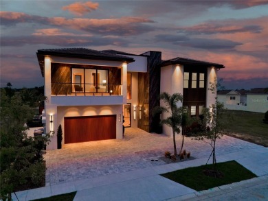 Experience unparalleled luxury and modern living in this on Reunion Resort Golf Course in Florida - for sale on GolfHomes.com, golf home, golf lot