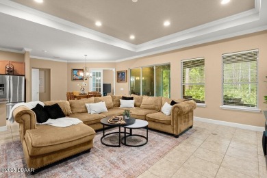 Welcome Home to your private oasis nestled along a peaceful on Plantation Bay Golf and Country Club in Florida - for sale on GolfHomes.com, golf home, golf lot