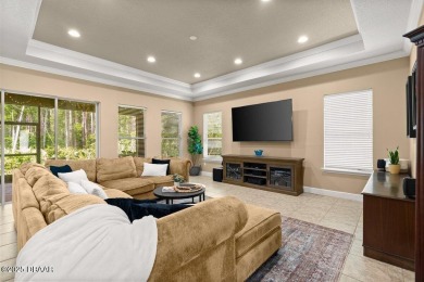 Welcome Home to your private oasis nestled along a peaceful on Plantation Bay Golf and Country Club in Florida - for sale on GolfHomes.com, golf home, golf lot
