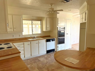 Spacious double-wide manufactured home in the highly sought on Portola Country Club in California - for sale on GolfHomes.com, golf home, golf lot