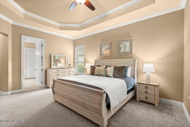 Welcome Home to your private oasis nestled along a peaceful on Plantation Bay Golf and Country Club in Florida - for sale on GolfHomes.com, golf home, golf lot