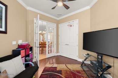 Welcome Home to your private oasis nestled along a peaceful on Plantation Bay Golf and Country Club in Florida - for sale on GolfHomes.com, golf home, golf lot