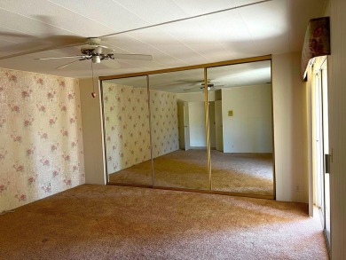 Spacious double-wide manufactured home in the highly sought on Portola Country Club in California - for sale on GolfHomes.com, golf home, golf lot