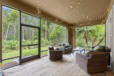 Welcome Home to your private oasis nestled along a peaceful on Plantation Bay Golf and Country Club in Florida - for sale on GolfHomes.com, golf home, golf lot