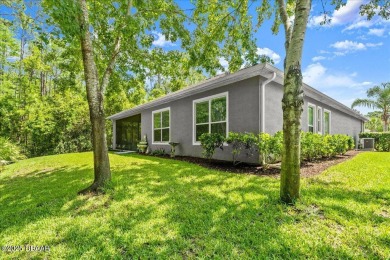 Welcome Home to your private oasis nestled along a peaceful on Plantation Bay Golf and Country Club in Florida - for sale on GolfHomes.com, golf home, golf lot