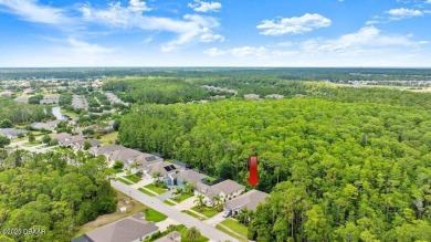 Welcome Home to your private oasis nestled along a peaceful on Plantation Bay Golf and Country Club in Florida - for sale on GolfHomes.com, golf home, golf lot