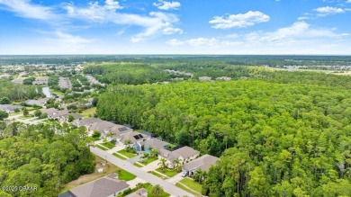 Welcome Home to your private oasis nestled along a peaceful on Plantation Bay Golf and Country Club in Florida - for sale on GolfHomes.com, golf home, golf lot