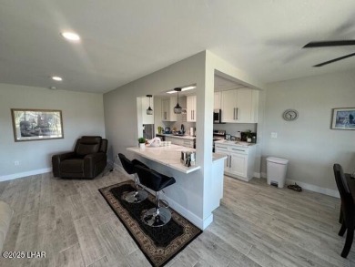 Experience Serenity & Style on the Golf Course! Nestled in a on London Bridge Golf Course in Arizona - for sale on GolfHomes.com, golf home, golf lot