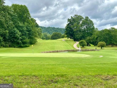 Picturesque 1.29-acre lot overlooks the 12th green, featuring a on Mountain Harbour Golf Club in North Carolina - for sale on GolfHomes.com, golf home, golf lot