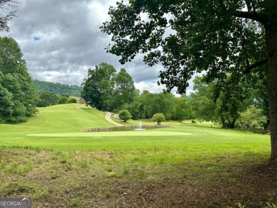 Picturesque 1.29-acre lot overlooks the 12th green, featuring a on Mountain Harbour Golf Club in North Carolina - for sale on GolfHomes.com, golf home, golf lot