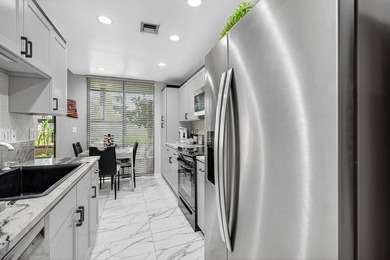 Beautifully updated La Paz condo offered fully furnished at on Boca Pointe Country Club in Florida - for sale on GolfHomes.com, golf home, golf lot