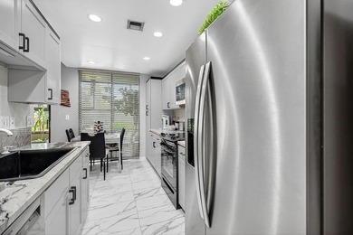 Beautifully updated La Paz condo offered fully furnished at on  in Florida - for sale on GolfHomes.com, golf home, golf lot