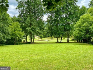 Picturesque 1.29-acre lot overlooks the 12th green, featuring a on Mountain Harbour Golf Club in North Carolina - for sale on GolfHomes.com, golf home, golf lot