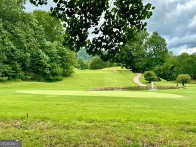 Picturesque 1.29-acre lot overlooks the 12th green, featuring a on Mountain Harbour Golf Club in North Carolina - for sale on GolfHomes.com, golf home, golf lot