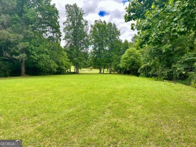 Picturesque 1.29-acre lot overlooks the 12th green, featuring a on Mountain Harbour Golf Club in North Carolina - for sale on GolfHomes.com, golf home, golf lot