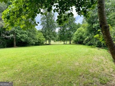 Picturesque 1.29-acre lot overlooks the 12th green, featuring a on Mountain Harbour Golf Club in North Carolina - for sale on GolfHomes.com, golf home, golf lot