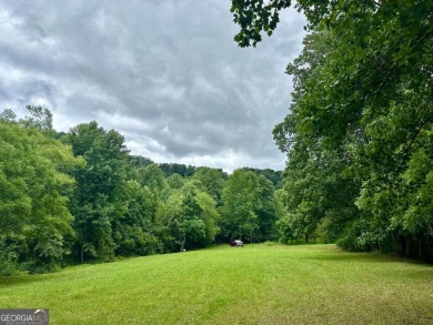 Picturesque 1.29-acre lot overlooks the 12th green, featuring a on Mountain Harbour Golf Club in North Carolina - for sale on GolfHomes.com, golf home, golf lot