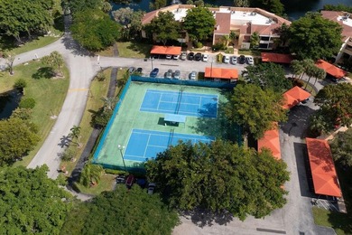 Beautifully updated La Paz condo offered fully furnished at on Boca Pointe Country Club in Florida - for sale on GolfHomes.com, golf home, golf lot