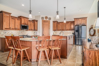 Charming LAKEFRONT RANCH WITH WALKOUT BASEMENT WITH OVER 3300 on Lake of Four Seasons Country Club in Indiana - for sale on GolfHomes.com, golf home, golf lot