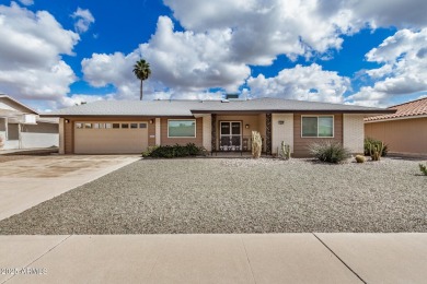 Step into this lovingly cared-for 2-bedroom, 2-bathroom home in on Sun City Lakes West and East in Arizona - for sale on GolfHomes.com, golf home, golf lot