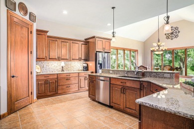 Charming LAKEFRONT RANCH WITH WALKOUT BASEMENT WITH OVER 3300 on Lake of Four Seasons Country Club in Indiana - for sale on GolfHomes.com, golf home, golf lot