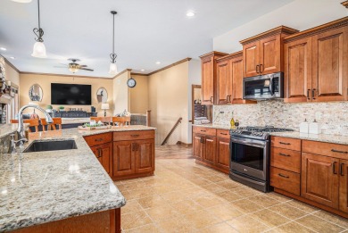 Charming LAKEFRONT RANCH WITH WALKOUT BASEMENT WITH OVER 3300 on Lake of Four Seasons Country Club in Indiana - for sale on GolfHomes.com, golf home, golf lot