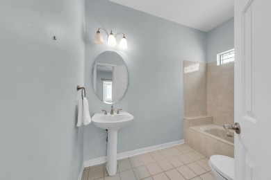 LAKEFRONT LIVING IN GATED SOUTHWIND - ROOM TO UPDATE, VIEWS TO on Golf Club at Bluewater Bay Resort in Florida - for sale on GolfHomes.com, golf home, golf lot