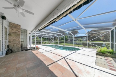 LAKEFRONT LIVING IN GATED SOUTHWIND - ROOM TO UPDATE, VIEWS TO on Golf Club at Bluewater Bay Resort in Florida - for sale on GolfHomes.com, golf home, golf lot