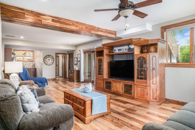 Charming LAKEFRONT RANCH WITH WALKOUT BASEMENT WITH OVER 3300 on Lake of Four Seasons Country Club in Indiana - for sale on GolfHomes.com, golf home, golf lot