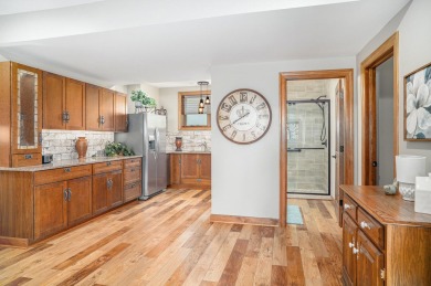 Charming LAKEFRONT RANCH WITH WALKOUT BASEMENT WITH OVER 3300 on Lake of Four Seasons Country Club in Indiana - for sale on GolfHomes.com, golf home, golf lot