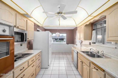 Step into this lovingly cared-for 2-bedroom, 2-bathroom home in on Sun City Lakes West and East in Arizona - for sale on GolfHomes.com, golf home, golf lot