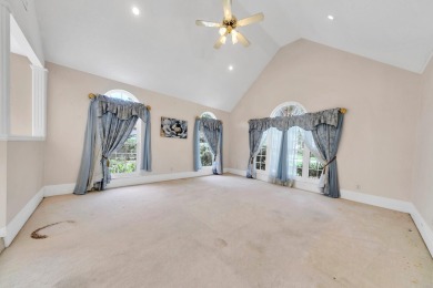LAKEFRONT LIVING IN GATED SOUTHWIND - ROOM TO UPDATE, VIEWS TO on Golf Club at Bluewater Bay Resort in Florida - for sale on GolfHomes.com, golf home, golf lot