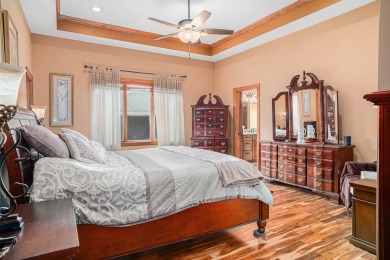 Charming LAKEFRONT RANCH WITH WALKOUT BASEMENT WITH OVER 3300 on Lake of Four Seasons Country Club in Indiana - for sale on GolfHomes.com, golf home, golf lot