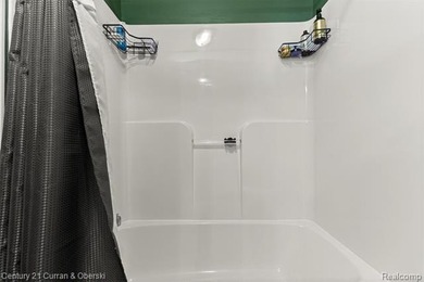 This beautiful 2-bedroom condo in Southfield offers an array of on Evergreen Hills Golf Course in Michigan - for sale on GolfHomes.com, golf home, golf lot