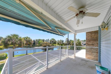 LAKEFRONT LIVING IN GATED SOUTHWIND - ROOM TO UPDATE, VIEWS TO on Golf Club at Bluewater Bay Resort in Florida - for sale on GolfHomes.com, golf home, golf lot