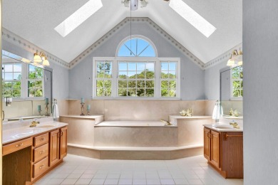 LAKEFRONT LIVING IN GATED SOUTHWIND - ROOM TO UPDATE, VIEWS TO on Golf Club at Bluewater Bay Resort in Florida - for sale on GolfHomes.com, golf home, golf lot