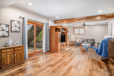 Charming LAKEFRONT RANCH WITH WALKOUT BASEMENT WITH OVER 3300 on Lake of Four Seasons Country Club in Indiana - for sale on GolfHomes.com, golf home, golf lot