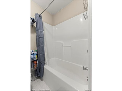 This beautiful 2-bedroom condo in Southfield offers an array of on Evergreen Hills Golf Course in Michigan - for sale on GolfHomes.com, golf home, golf lot