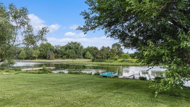 Charming LAKEFRONT RANCH WITH WALKOUT BASEMENT WITH OVER 3300 on Lake of Four Seasons Country Club in Indiana - for sale on GolfHomes.com, golf home, golf lot