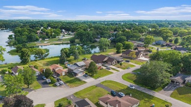Charming LAKEFRONT RANCH WITH WALKOUT BASEMENT WITH OVER 3300 on Lake of Four Seasons Country Club in Indiana - for sale on GolfHomes.com, golf home, golf lot