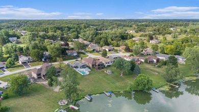 Charming LAKEFRONT RANCH WITH WALKOUT BASEMENT WITH OVER 3300 on Lake of Four Seasons Country Club in Indiana - for sale on GolfHomes.com, golf home, golf lot